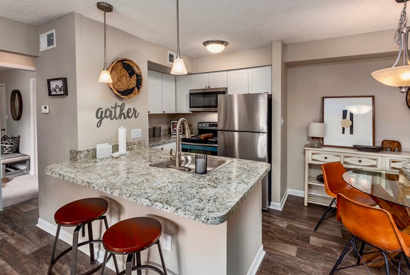 College apartment kitchen with stools and countertop